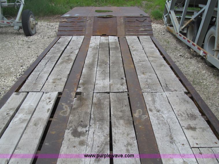 image for item D7370 1991 Trail King TK100HDG-493 triple axle lowboy trailer