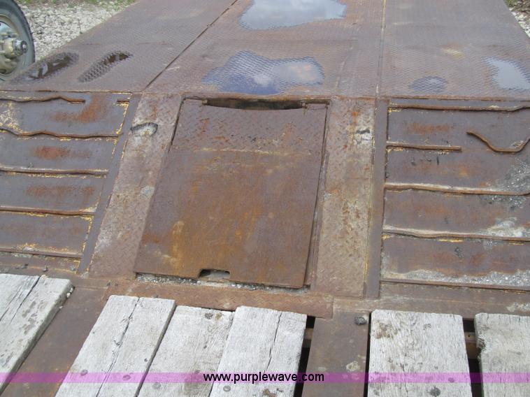 image for item D7370 1991 Trail King TK100HDG-493 triple axle lowboy trailer