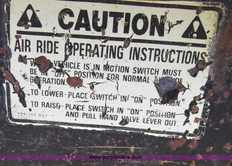 image for item D7370 1991 Trail King TK100HDG-493 triple axle lowboy trailer