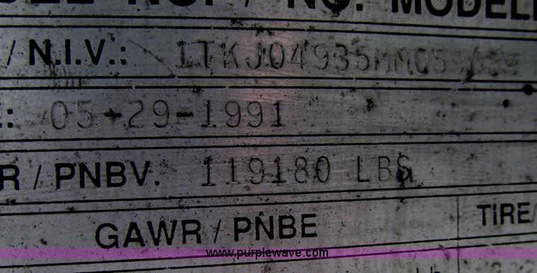 image for item D7370 1991 Trail King TK100HDG-493 triple axle lowboy trailer