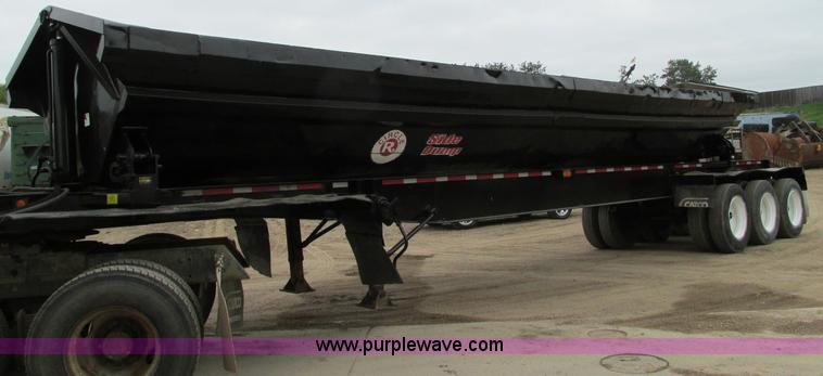 image for item E5134 1999 Circle R SS443 tri axle side dump trailer