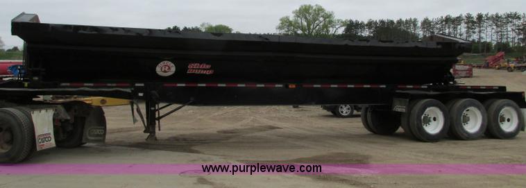 image for item E5134 1999 Circle R SS443 tri axle side dump trailer