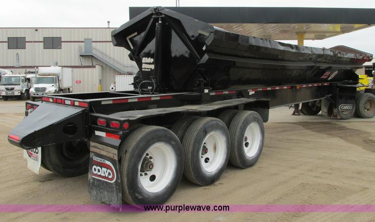 image for item E5134 1999 Circle R SS443 tri axle side dump trailer