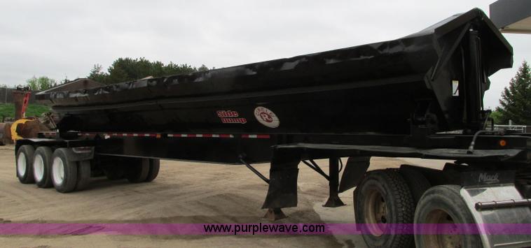 image for item E5134 1999 Circle R SS443 tri axle side dump trailer