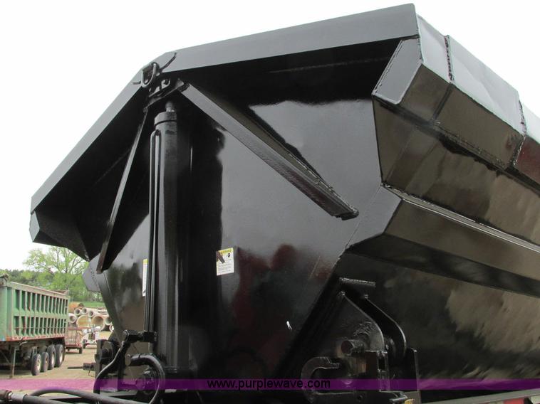 image for item E5134 1999 Circle R SS443 tri axle side dump trailer