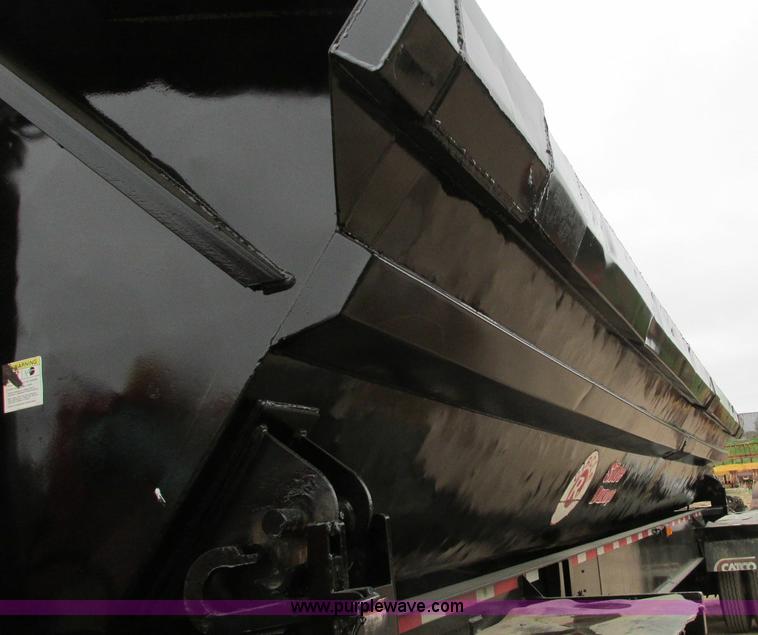 image for item E5134 1999 Circle R SS443 tri axle side dump trailer