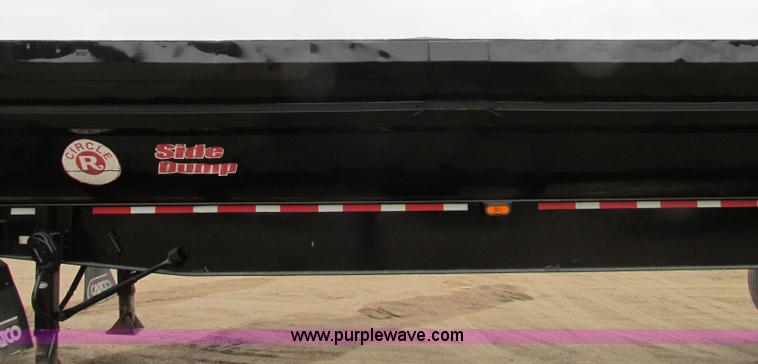 image for item E5134 1999 Circle R SS443 tri axle side dump trailer