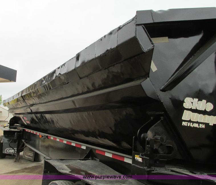image for item E5134 1999 Circle R SS443 tri axle side dump trailer