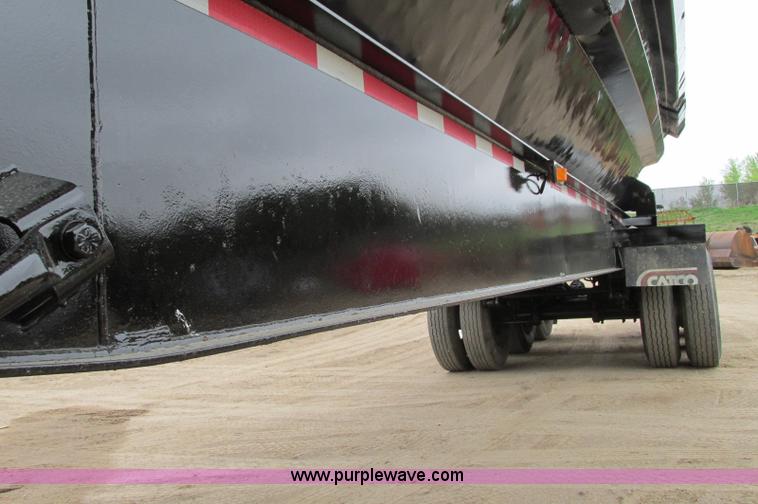 image for item E5134 1999 Circle R SS443 tri axle side dump trailer