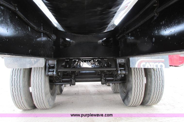 image for item E5134 1999 Circle R SS443 tri axle side dump trailer