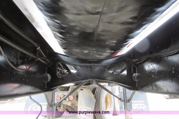 image for item E5134 1999 Circle R SS443 tri axle side dump trailer