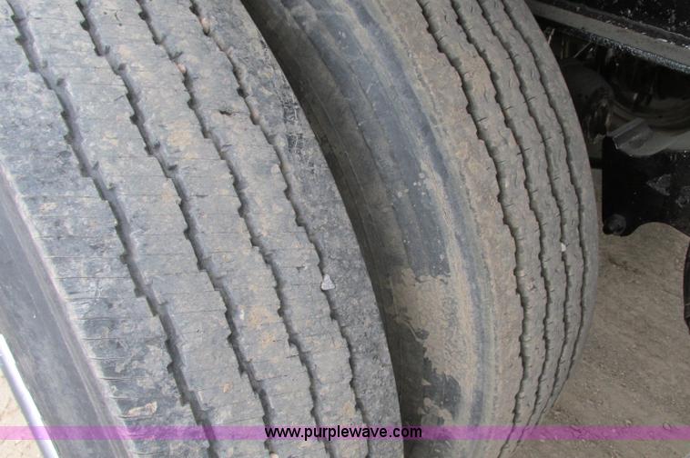 image for item E5134 1999 Circle R SS443 tri axle side dump trailer