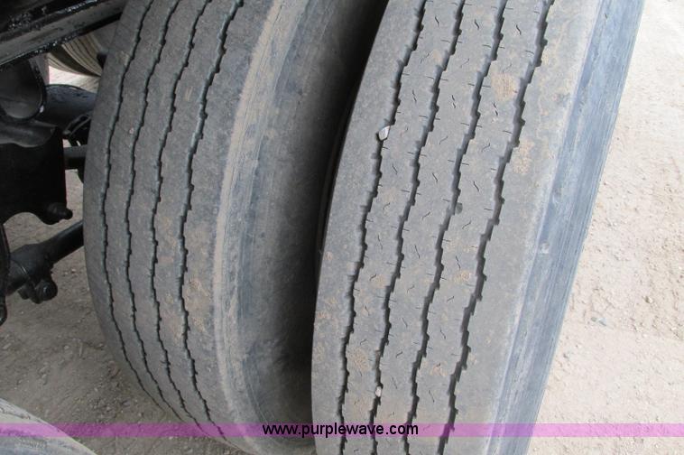 image for item E5134 1999 Circle R SS443 tri axle side dump trailer