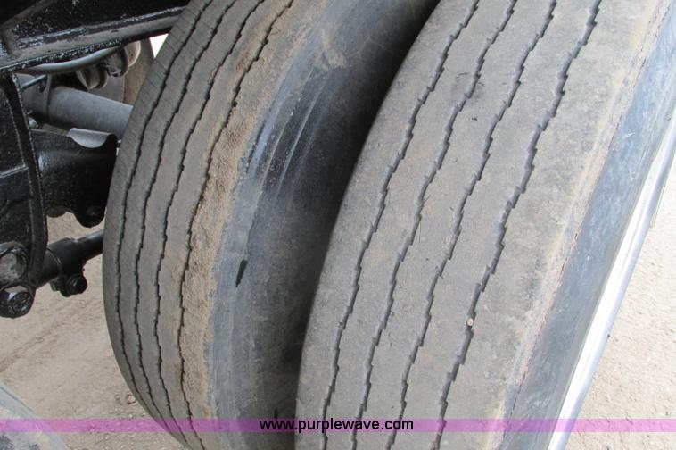 image for item E5134 1999 Circle R SS443 tri axle side dump trailer