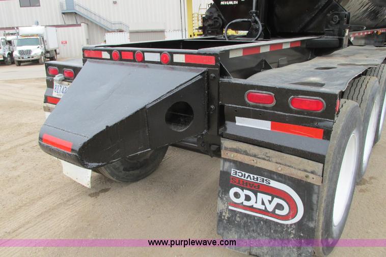 image for item E5134 1999 Circle R SS443 tri axle side dump trailer