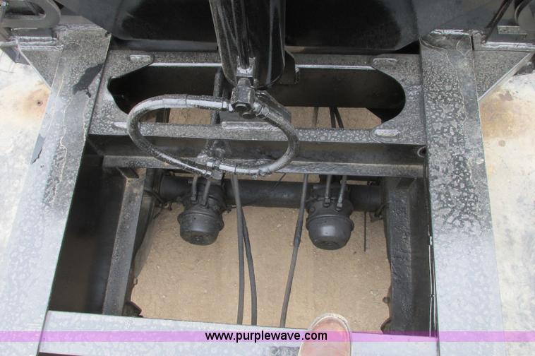 image for item E5134 1999 Circle R SS443 tri axle side dump trailer