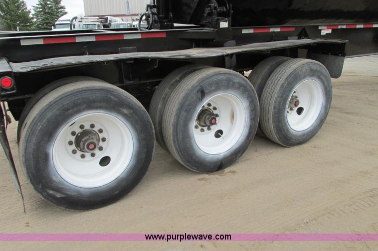 image for item E5134 1999 Circle R SS443 tri axle side dump trailer