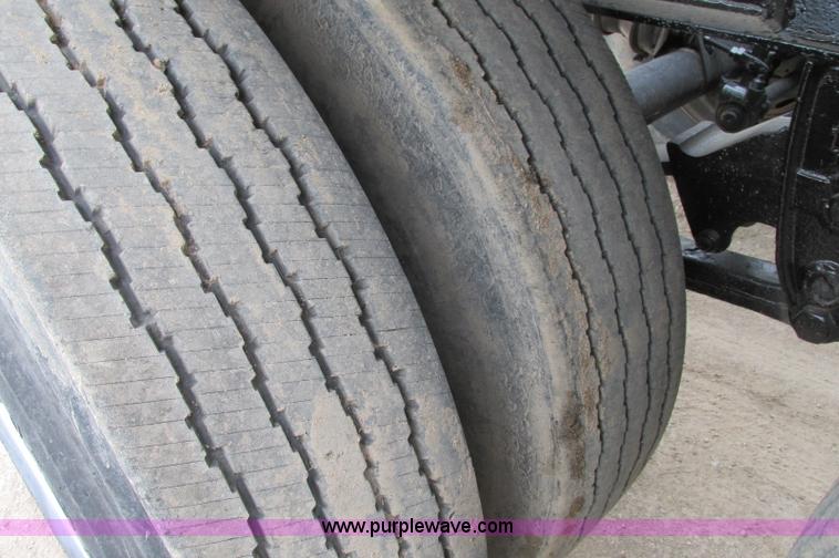 image for item E5134 1999 Circle R SS443 tri axle side dump trailer