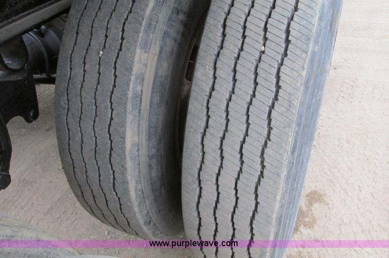 image for item E5134 1999 Circle R SS443 tri axle side dump trailer