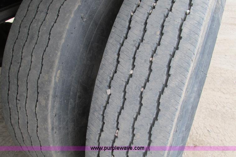 image for item E5134 1999 Circle R SS443 tri axle side dump trailer