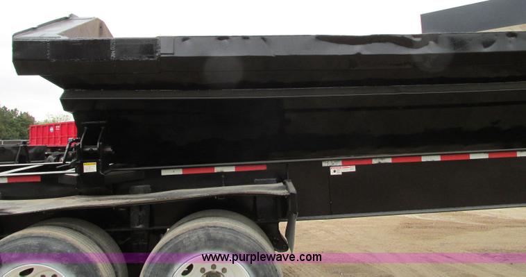 image for item E5134 1999 Circle R SS443 tri axle side dump trailer