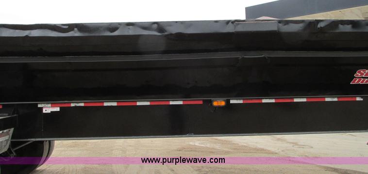 image for item E5134 1999 Circle R SS443 tri axle side dump trailer