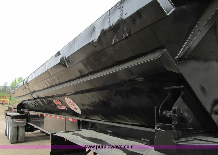 image for item E5134 1999 Circle R SS443 tri axle side dump trailer