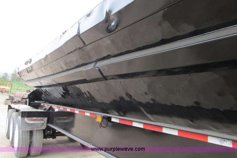 image for item E5134 1999 Circle R SS443 tri axle side dump trailer