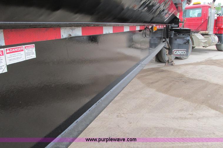 image for item E5134 1999 Circle R SS443 tri axle side dump trailer