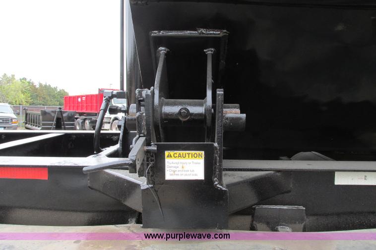 image for item E5134 1999 Circle R SS443 tri axle side dump trailer