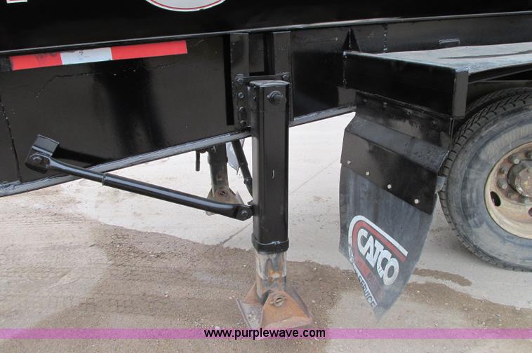 image for item E5134 1999 Circle R SS443 tri axle side dump trailer