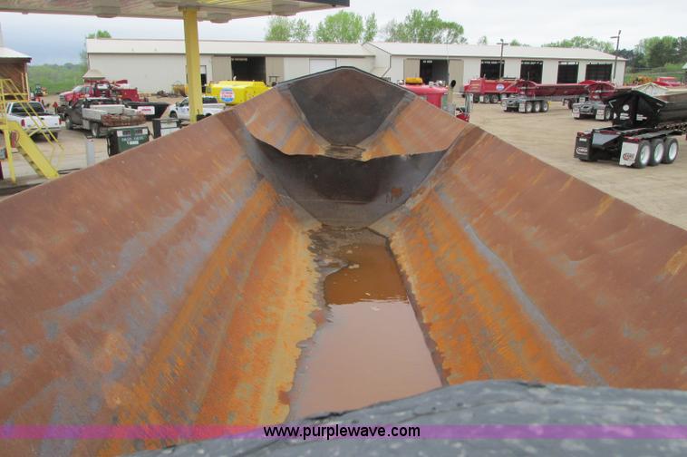 image for item E5134 1999 Circle R SS443 tri axle side dump trailer