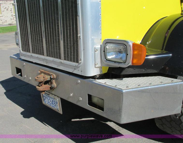 image for item E5138 2000 Peterbilt 378 quad axle dump truck