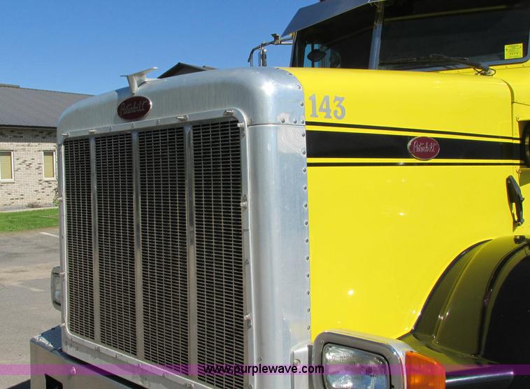 image for item E5138 2000 Peterbilt 378 quad axle dump truck