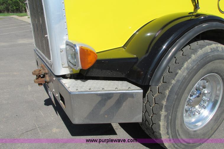 image for item E5138 2000 Peterbilt 378 quad axle dump truck