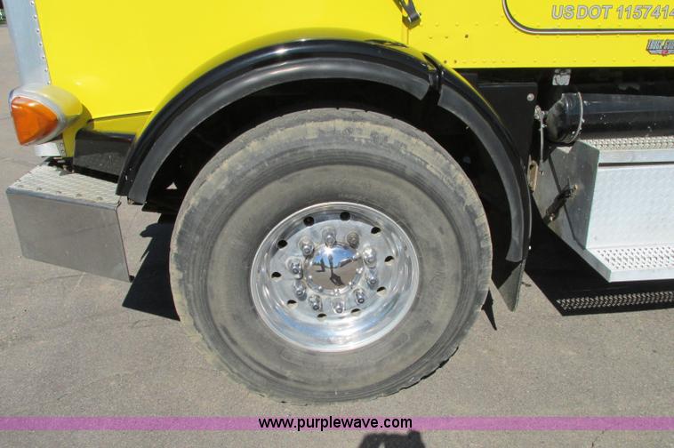 image for item E5138 2000 Peterbilt 378 quad axle dump truck