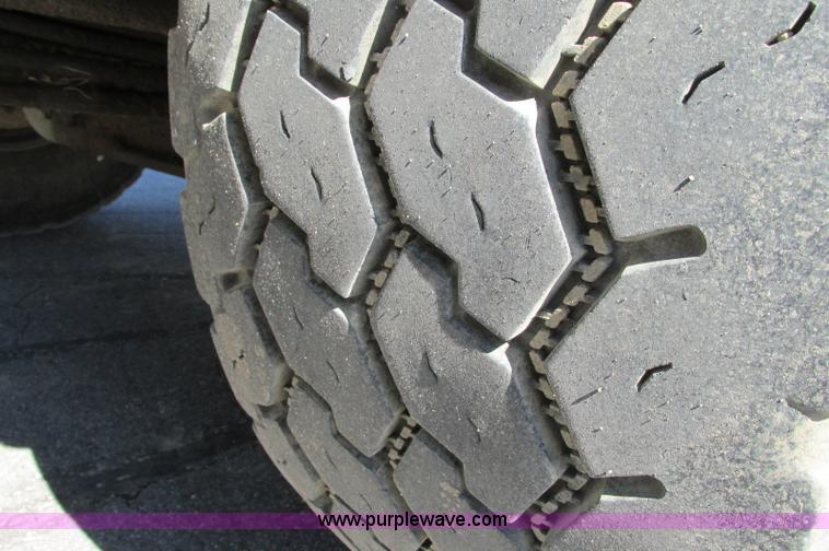 image for item E5138 2000 Peterbilt 378 quad axle dump truck