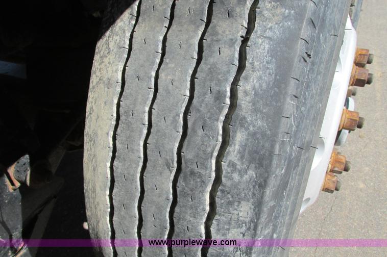 image for item E5138 2000 Peterbilt 378 quad axle dump truck