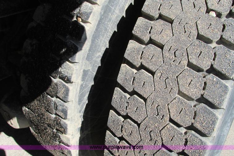 image for item E5138 2000 Peterbilt 378 quad axle dump truck