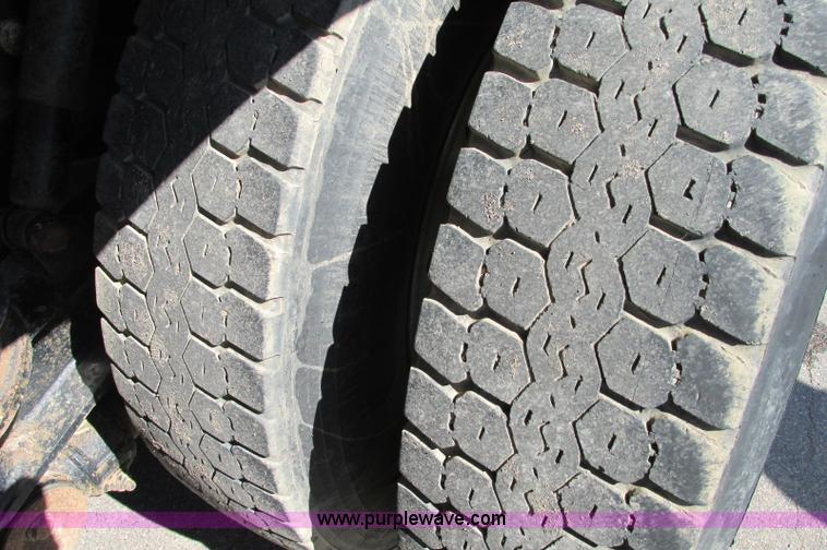 image for item E5138 2000 Peterbilt 378 quad axle dump truck