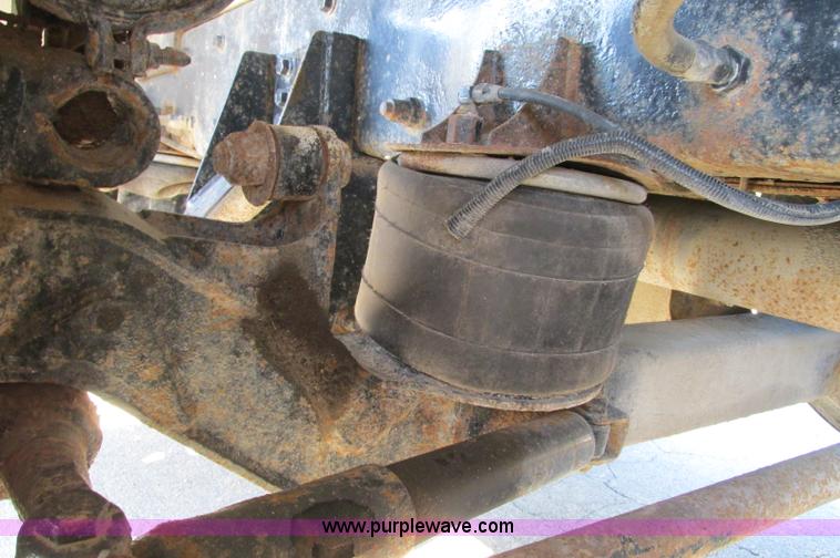 image for item E5138 2000 Peterbilt 378 quad axle dump truck