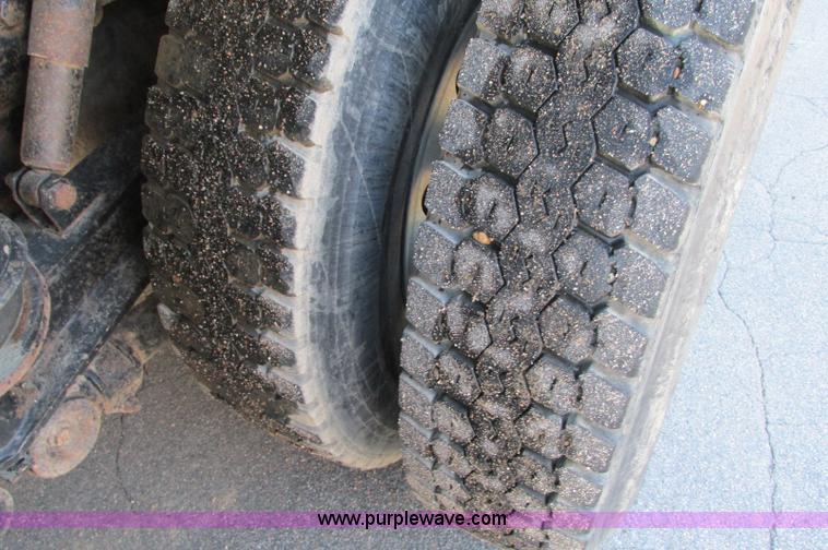 image for item E5138 2000 Peterbilt 378 quad axle dump truck