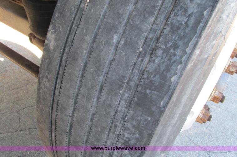 image for item E5138 2000 Peterbilt 378 quad axle dump truck