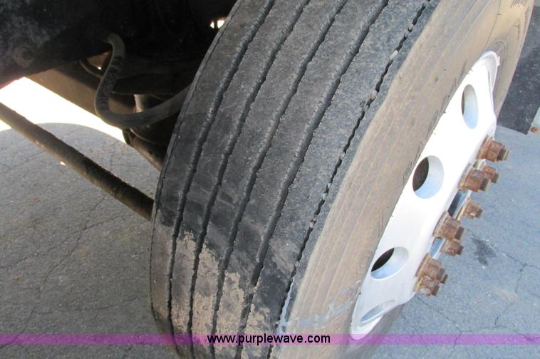 image for item E5138 2000 Peterbilt 378 quad axle dump truck