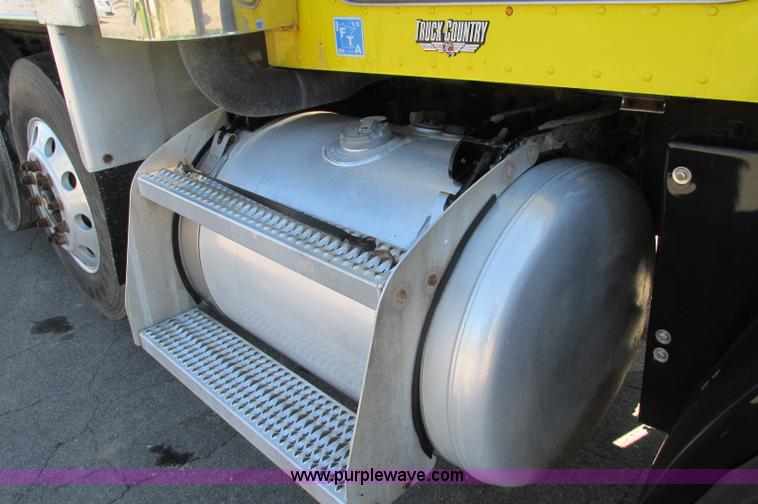 image for item E5138 2000 Peterbilt 378 quad axle dump truck