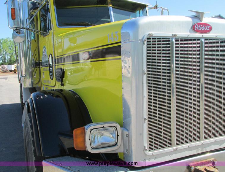 image for item E5138 2000 Peterbilt 378 quad axle dump truck