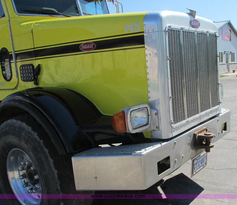 image for item E5138 2000 Peterbilt 378 quad axle dump truck