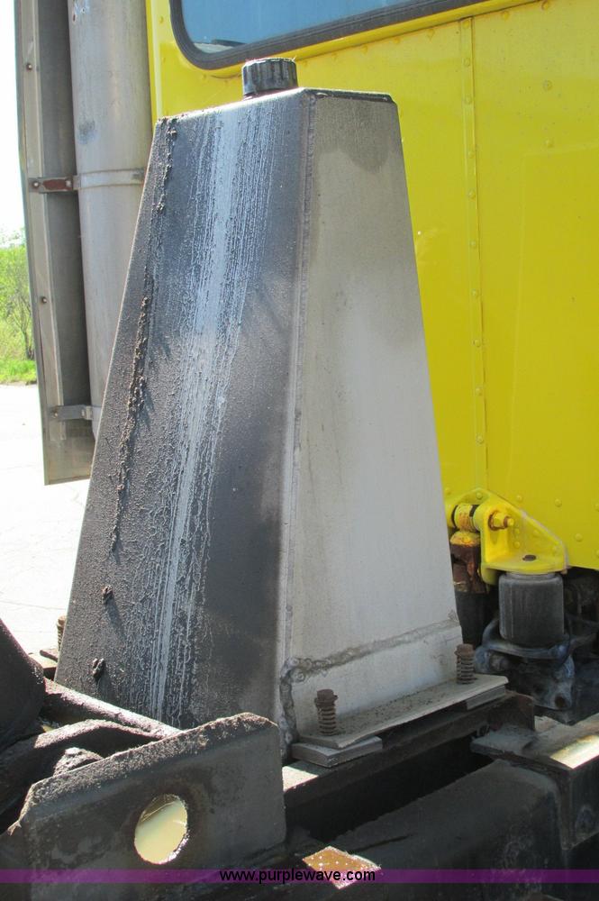 image for item E5138 2000 Peterbilt 378 quad axle dump truck