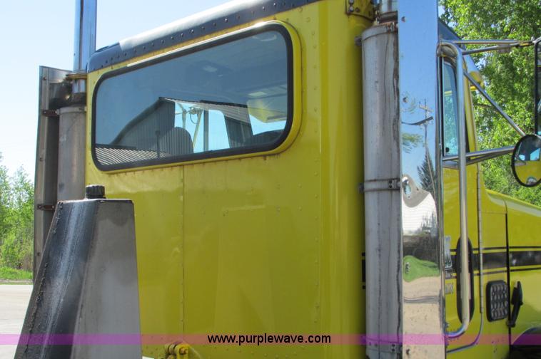 image for item E5138 2000 Peterbilt 378 quad axle dump truck