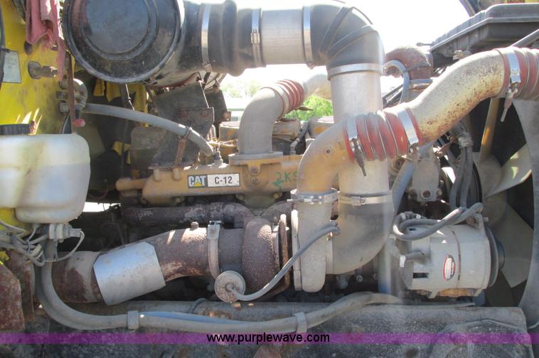 image for item E5138 2000 Peterbilt 378 quad axle dump truck